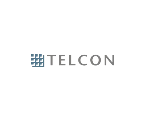 Das Logo von Telcon besteht aus den dunkelgrauen Großbuchstaben TELCON und einem dunkelblauen Gitter aus neun quadratischen Feldern. In den Feldern sitzen kleinere dunkelblaue Gradrate an der oberen linken Ecke.